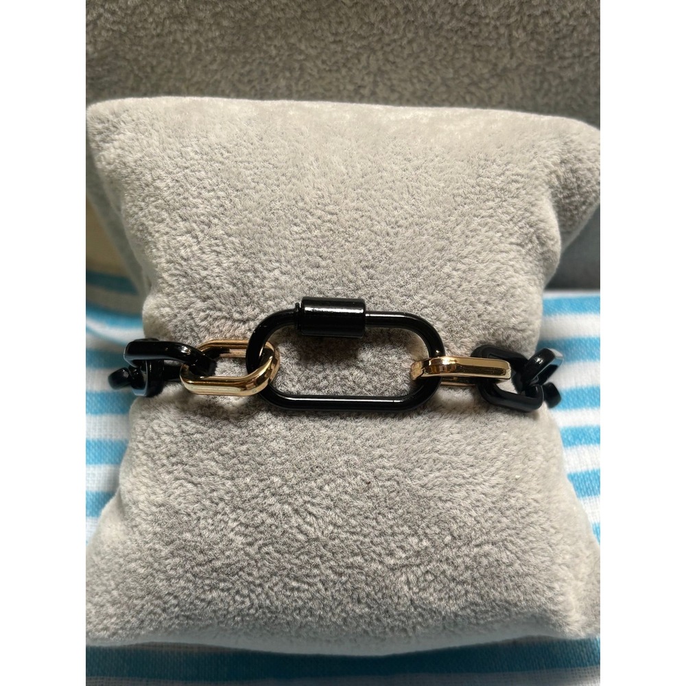 #59. Black chain-link bracelet.